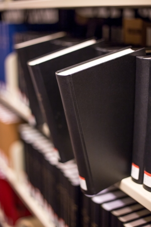 plain book jut out a bookshelfの写真素材