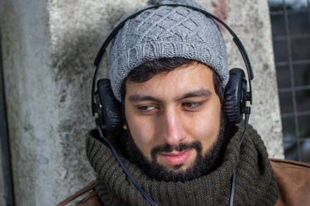 beard man hearing musicの写真素材