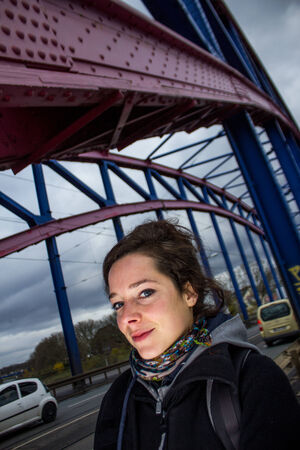 woman outdoors on a bridgeの写真素材