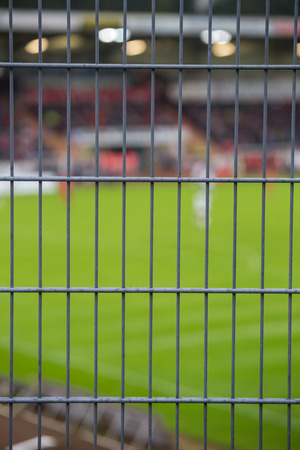 football stadium fence backgroundの写真素材