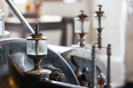 old oil cans of an steam engineの写真素材