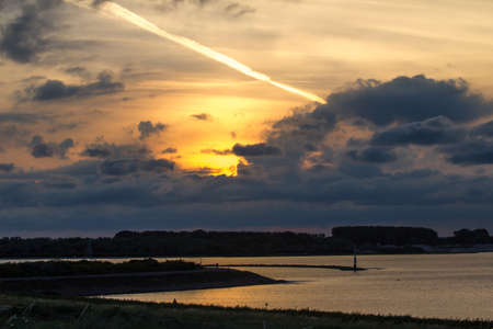sunrise at the shorline in holland