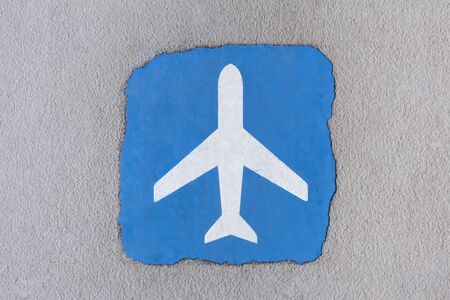 vintage airplane sign on the groundの写真素材