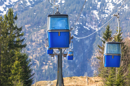 small funicular in front of mountain hillsの写真素材
