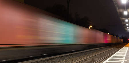 Container train speed blur at nightの写真素材