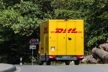 siegen, nrw/germany - 02 08 19: dhl delivery truck near siegen germany