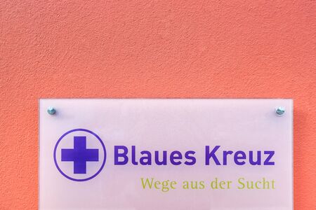 altena, North Rhine-Westphalia/germany - 19 08 19: blaues kreuz sign on an building in altena germanyのeditorial素材