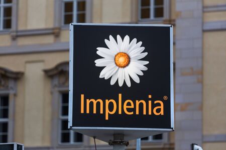 berlin, brandenburg/germany - 22 12 18: implenia construction site sign berlin germanyのeditorial素材