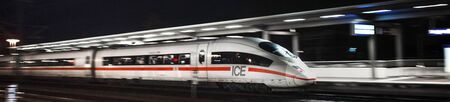siegburg, North Rhine-Westphalia/germany - 28 11 19: ICE train passing siegburg germany at night panoramaのeditorial素材