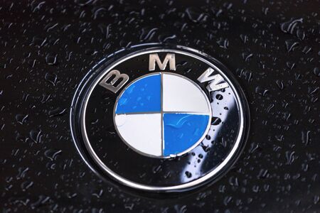 siegen, North Rhine-Westphalia/germany - 14 12 19: bmw car logo on a rainy day near siegen germany