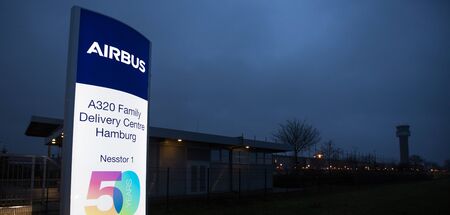 finkenwerder, hamburg/germany - 03 01 2020: an airbus sign at night at the factory and airport finkenwerder hamburg germanyのeditorial素材