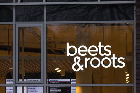 hamburg, hamburg/germany - 05 01 2020: beets & roots sign in hamburg germanyのeditorial素材