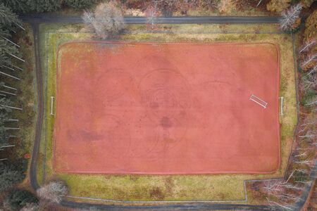 Empty soccer field from above in the forestの写真素材