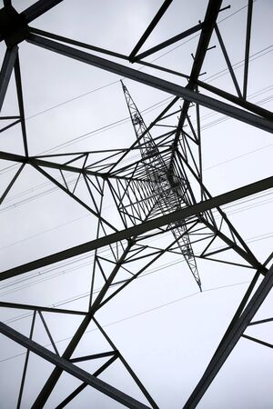 an electricity pylon from below perpendicularの写真素材