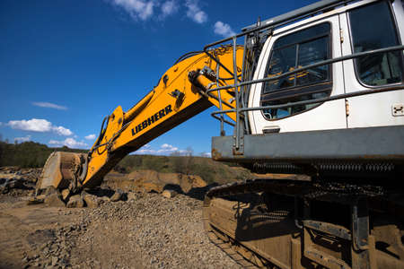 hachenburg, Rhineland-Palatinate/germany - 12 04 2020: liebherr modern excavator near hachenburg germanyのeditorial素材