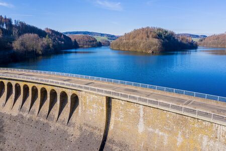 stone water dam in the sun from aboveの写真素材