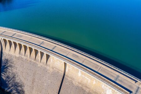 stone water dam in the sun from aboveの写真素材