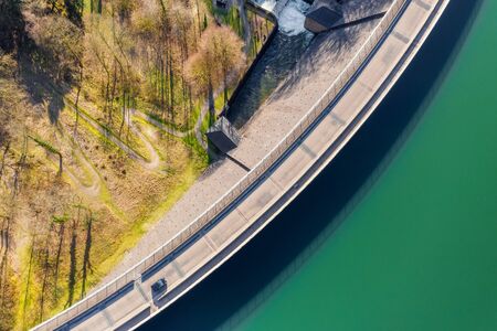 stone water dam in the sun from aboveの写真素材