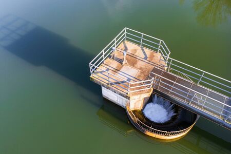 lake overflow in the sun from aboveの写真素材