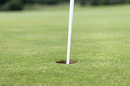 golf flag close up on a golf courseの写真素材