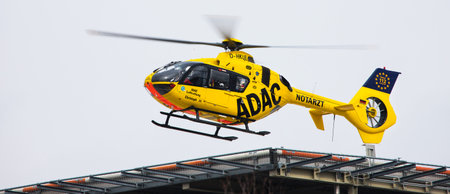 siegen, north rhine westphalia / germany - 10 03 2021: an adac german rescue helicopter starting from his home station in siegen germany panoramaのeditorial素材