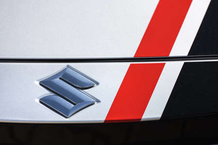 siegen, north rhine westphalia / germany - 25 04 2021: a suzuki car sign on a buildingのeditorial素材