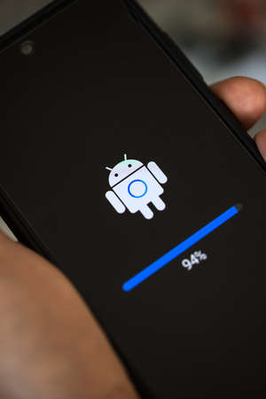 siegen, north rhine westphalia / germany - 02 06 2021: a smartphone performing an android updateのeditorial素材