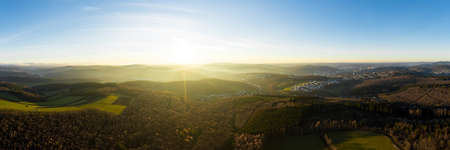 the siegerland forest and city from above in germany in autumn as a high definition panoramaの写真素材