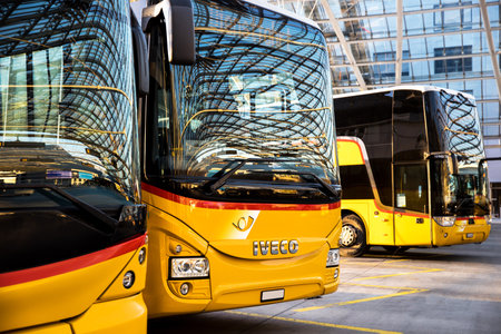 chur, graubuenden, switzerland - 07 11 2021: swiss postauto buses in a swiss transportation stationのeditorial素材