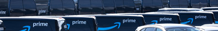 Bad Hersfeld, Hesse, Germany - 15 09 2023: a line of Amazon Prime delivery trucksのeditorial素材