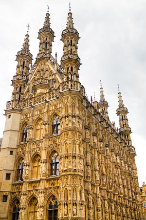 historic leuven town hall in belgiumの写真素材