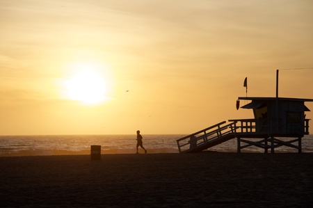 Beach Runner at Sunset in Santa Monica, California.の写真素材
