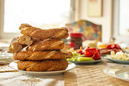 Delicious rich Traditional Turkish breakfast include tomatoes, cucumbers, cheese, butter, eggs,...