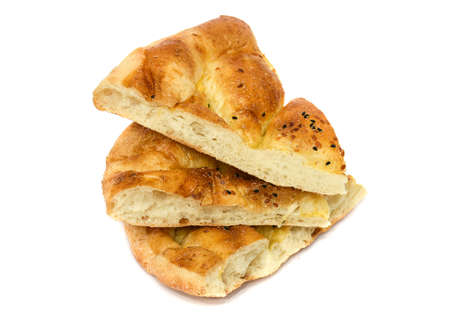 Turkish Ramadan Bread - ramazan pidesi (Pita) isolated on white. Traditional popular food for...
