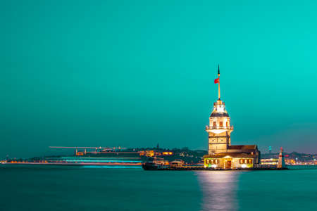 Magnific view of Maiden's Tower (aka Kiz kulesi) at night time. Istanbul's main attractions.の写真素材