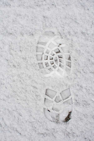 Closeup of footsteps on the fresh friable snow.の写真素材