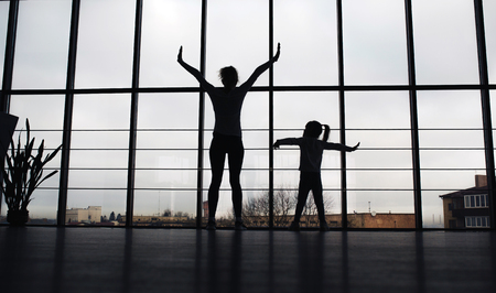 Charming family spends time in the gymの写真素材