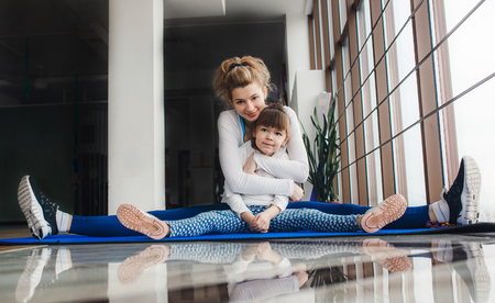 Charming family spends time in the gymの写真素材