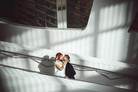 Wedding couple in a futuristic buildingの写真素材