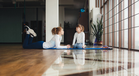 Mother and daughter have fun in the gymの写真素材
