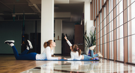 Mother and daughter have fun in the gymの写真素材