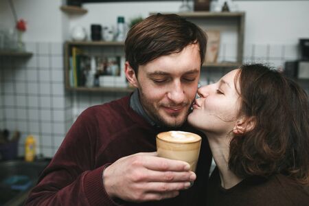 Vintage couple preparing coffee. Coffee shopの写真素材