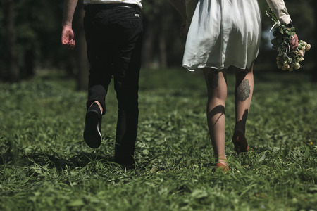 beautiful young couple having fun in the parkの写真素材