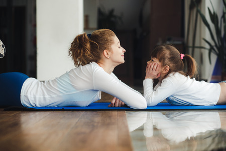 Mother and daughter have fun in the gymの写真素材