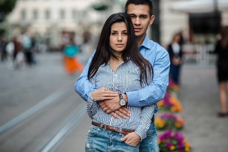 beautiful couple having fun and walking at the big cityの写真素材