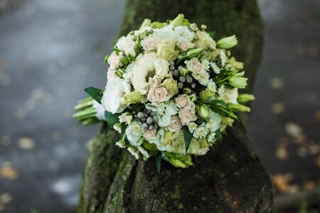 Very beautiful bridal bouquet lying on the tableの写真素材