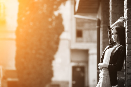 woman leaned on the wallの写真素材