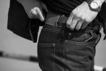 A man dressed in jeans close-up shotの写真素材