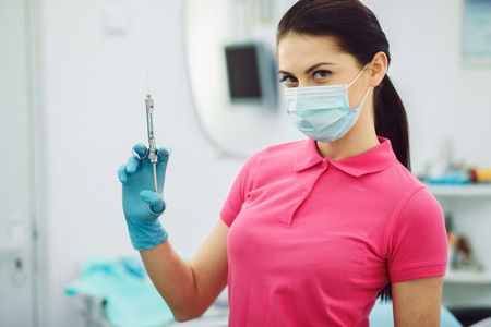 Dental anesthesia on the background of the patientの写真素材