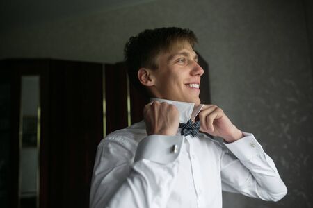 close view of the groom who is preparing for the weddingの写真素材